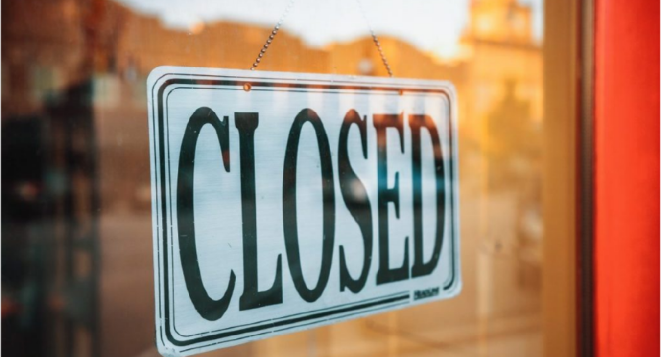 A closed sign can be seen on a door. (CityNews)