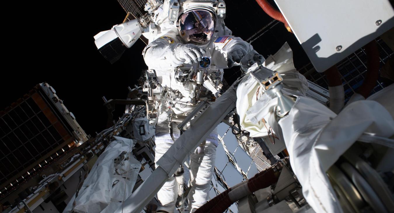 NASA astronaut Anil Menon conducts a spacewalk on Aug. 6, 2026, to prepare the International Space Station for future upgrades to its power system.