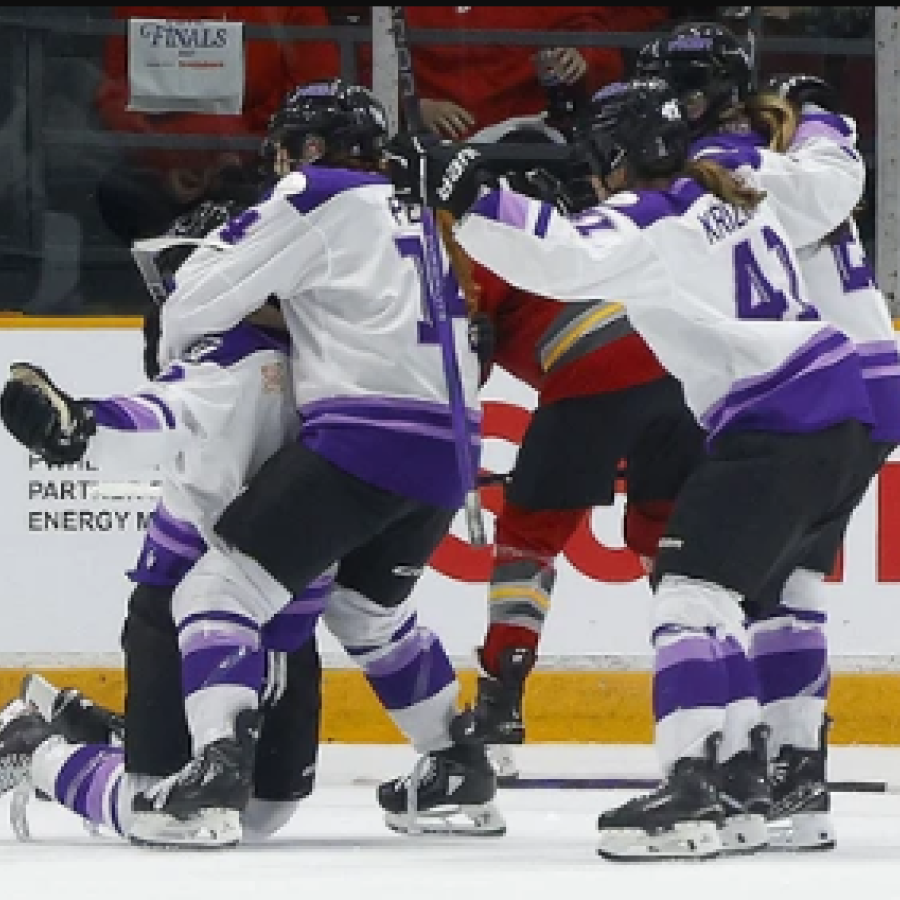 Britta Curl-Salemme, far left, celebrates with Frost teammates after scoring the winning goal against the Charge in overtime